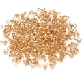 Macro shot of polished gold shell crimp bead covers for DIY jewelry end finish - 4mm / KC Gold