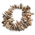 Makroaufnahme von unregelmäßigen polierten Naturtigeraugen- und Achatsteinen für Schmuck - 8-25mm (Ca. 40cm) / Landschaftsjaspis