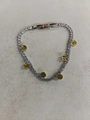 Silberfarbenes Armband mit klaren und gelben Zirkonia und Klappverschluss. - Silbernes Armband / Gelb