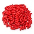 Macro shot of oval red maple wood beads with glossy finish for DIY jewelry making - Red