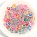 Colorful acrylic letter R beads for DIY jewelry in a white ceramic bowl for crafting - 100 Pcs/Pack / Letter R