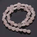 Macro-opname van hartvormige rozenkwarts kralen voor DIY sieraden maken - 10*11mm / Rozenkwarts