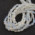 Platte ovale opaliet edelsteenkralen voor DIY sieraden met zachte blauwe gloed - 8*6mm / Opaal