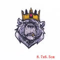 Detail shot of embroidered bear patch with crown and cigar, size 8.7x6.5cm, punk style - Crown Cigar Bear (PE5541CT)