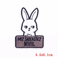 Detailed embroidery patch showing a white cartoon rabbit with sarcasm quote and black border - White Rabbit With Me Sarcastic Slogan (PE6083CT)