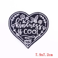 Black heart embroidered patch with Kindness IS COOL slogan and floral details, 7.9x7.2cm - Black Heart Slogan (PE6179CT) / Hot Melt Adhesive