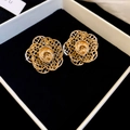 Elegant gold-toned hollow-out flower stud earrings displayed in a luxury jewelry box - Hollow Floral Metal Earrings (23#)
