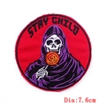 7.6cm Stay Child Grim Reaper embroidered patch with skull eating lollipop and red background - Reaper Lollipop Style (PE6538CT)
