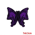Macro shot of butterfly skull embroidery patch showing 7x6.5cm size and purple stitching - Purple Butterfly Skull (PE6709CT)
