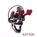 Skull and heart embroidered patch for punk apparel, white background, size 8.3x7.5cm - Side Face Skull With Heart Eyes Style (PE7024CT)