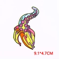 Vista detallada del parche bordado de pulpo banana colorido de 9,1x4,7 cm - Estilo Pulpo Plátano (PE7856CT)