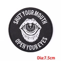 7.5cm round surrealist embroidered patch with Shut Your Mouth Open Your Eyes text - Lips Eyes Surrealist Style (PE8165CT)