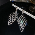 Close-up of elegant silver-colored rhinestone rhombus mesh tassel earrings in a box - Rhombus Hollow Tassel Style (11#)