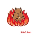 Detailed view of capybara in red flames embroidery patch showing 5.8x5.1cm dimensions - Fire Capybara (PE9406CT)