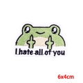 Cartoon frog embroidery patch with 'I hate all of you' text, 6x4cm DIY clothing sticker - Middle Finger Frog (PE9411CT)