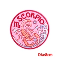 Detail of 8cm Scorpio zodiac embroidery patch with orange scorpion and star patterns - Scorpio (PE9122CT)