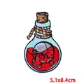Skull potion bottle embroidery patch with red skull and blue border, 5.1x8.4cm size - Skull in Bottle (PE8141CT)