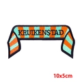 Macro detail of Kruikenstad striped embroidery patch with orange and green diagonal lines - Pe9604ct