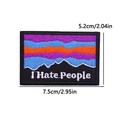 Macro view of embroidered mountain patch with I Hate People slogan and 7.5cm size mark - I Hate People Mountain (PE9988CT)