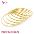 Minimalist gold-plated titanium steel stackable bangles set of 7 for women's jewelry. - 3mm Seven Rings Set - Inner Diameter 55mm / Gold