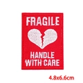 Detailed embroidery of a red Fragile patch with broken heart and dimensions of 4.8x6.6cm - Fragile Heart Style (PE8749CT)