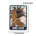 Detailed view of The Sun Tarot card embroidered patch with dimensions 8.2cm by 5.7cm - Sky Blue Sun Wings Style (PE12542CT)