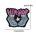 Detailed view of hip-hop embroidered patch with pink lettering and blue high-top sneakers - Pink Hip-Hop Shoes (PE11969CT)