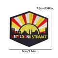 Detailed close-up of Oeteldonk Straalt embroidered badge with city silhouette - Hexagon City Shine (PE11271CT)