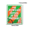 Detail shot of embroidered Kruikenstad patch with orange and green stripes and size specs - Postmark Stripe Style (PE11355CT)