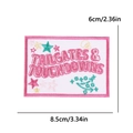 Detail view of pink Tailgates & Touchdowns embroidered patch, dimensions 8.5cm x 6cm - Tailgates & Touchdowns Style (PE15435CT)