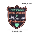 Kruikenstad shield-shaped embroidered patch with orange trim and Dutch text, 8.5x7.5cm - Building Shield Style (PE11361CT)