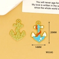 Close-up of anchor charms for DIY jewelry making with dimension markers - Anchor