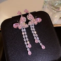 Detailed macro view of pink butterfly tassel earrings featuring sparkling cubic zirconia stones - Butterfly Long Tassel Style (18#) / Silver-Pink