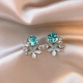 Close-up of elegant light blue enamel flower earrings with sparkling crystal accents - Silver Post Butterfly Flower Style / 1 Pair Pack / Silver/Blue
