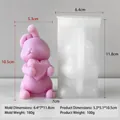 DIY Silikonform für Hasenkerze mit Herz zeigt Form und das fertige rosa Hasenmodell - Hase hält Herz-Stil (J-0347)
