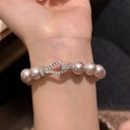 Elegant pearl beaded bracelet with sparkling zircon clasp for a vintage palace look. - Bracelet / Silver-Pink