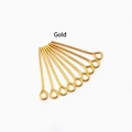 Detailed view of nine gold-plated iron eye pins for jewelry making on white background - Eye Pin 0.7x40 / Gold