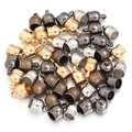 Close-up of assorted metal tassel caps with ribbed detail for DIY jewelry making - Hole 9mm / Multicolor