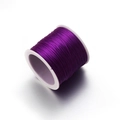 Flat purple crystal elastic string for DIY jewelry making on a white spool - Purple