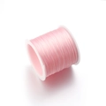Pink flat elastic beading thread on white plastic spool for DIY jewelry making - Light Pink