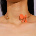 Close-up detail shot of vintage orange enamel flower petal choker worn on model neck - Orange Flower (5241)