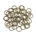 Detail view of bulk vintage bronze jump rings for DIY jewelry making and metal crafts - Bronze