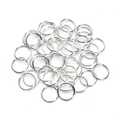 Detailed view of silver jump rings for DIY jewelry making and linking accessories - Silver