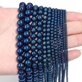 Detail view of metallic dark blue hematite beads in multiple sizes for DIY jewelry - 10mm (Approx 38pcs) / Electroplated Blue