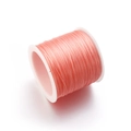 Pink flat elastic crystal string for DIY bracelet making wound on a white spool - Water Pink