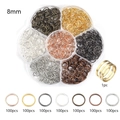 Macro detail of 8mm metal jump rings set in flower box with gold finger ring tool - 1 Box / 8mm Mixed Colors