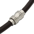 Macro detail of stainless steel magnetic clasp with ridges on dark brown leather cord - Horizontal Grooves