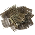 Macro view of vintage bronze metal hair combs for DIY jewelry making and handmade crafts - Antique Bronze