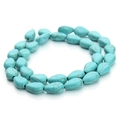 Macro-detail van druppelvormige turquoise kralen met bruine matrix voor DIY-sieraden - Platte druppelvorm / 8*12mm / Blauw