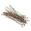 Macro view of vintage bronze ball head pins for DIY jewelry making accessories - Bronze